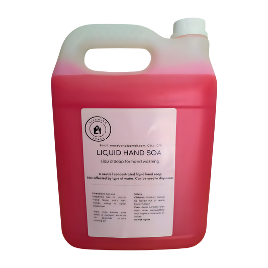 Red liquid hand soap container with a label on a white background